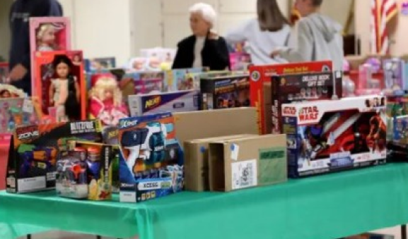 A table of presents at the Listen To Shafter Christmas Store event